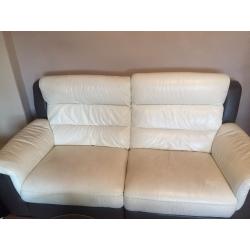 Two white and brown sofas in great condition one year old