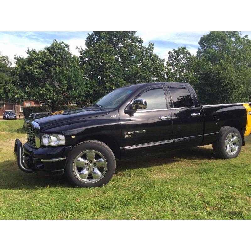 Low low millage, Dodge Ram Sport crew cab ( Rumble Bee) in excellent condition.