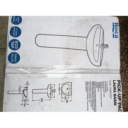 Roca basin pedestal and tap,