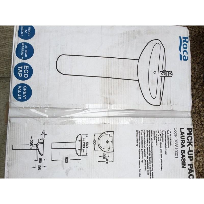 Roca basin pedestal and tap,
