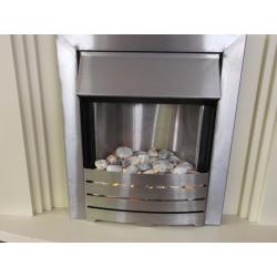 Electric fire and surroundings...... very cheap