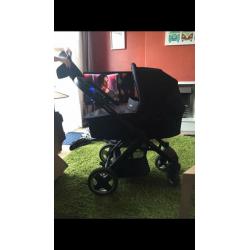 Oyster pushchair with carrycot. Includes rain cover and colour packs