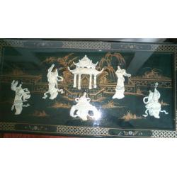 Oriental inlayed table with glass top over mother of pearl