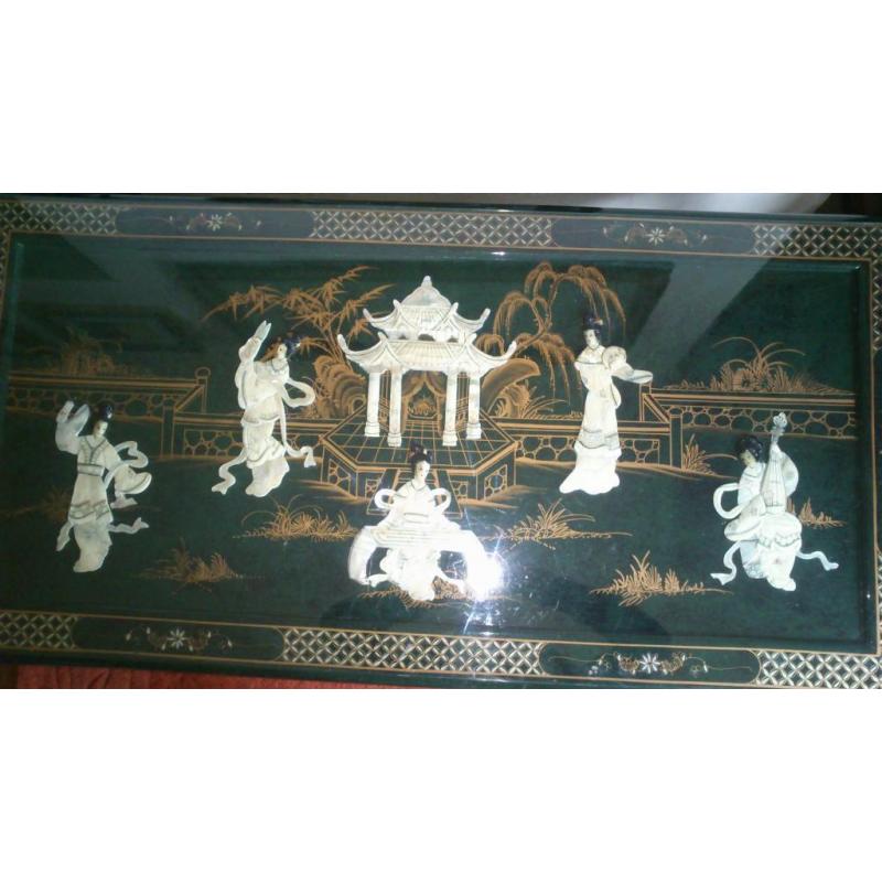 Oriental inlayed table with glass top over mother of pearl