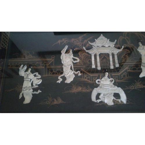 Oriental inlayed table with glass top over mother of pearl