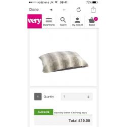 Faux fur throw and cushions to match