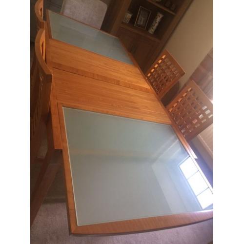 Glass topped table and chairs