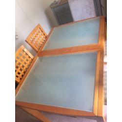 Glass topped table and chairs