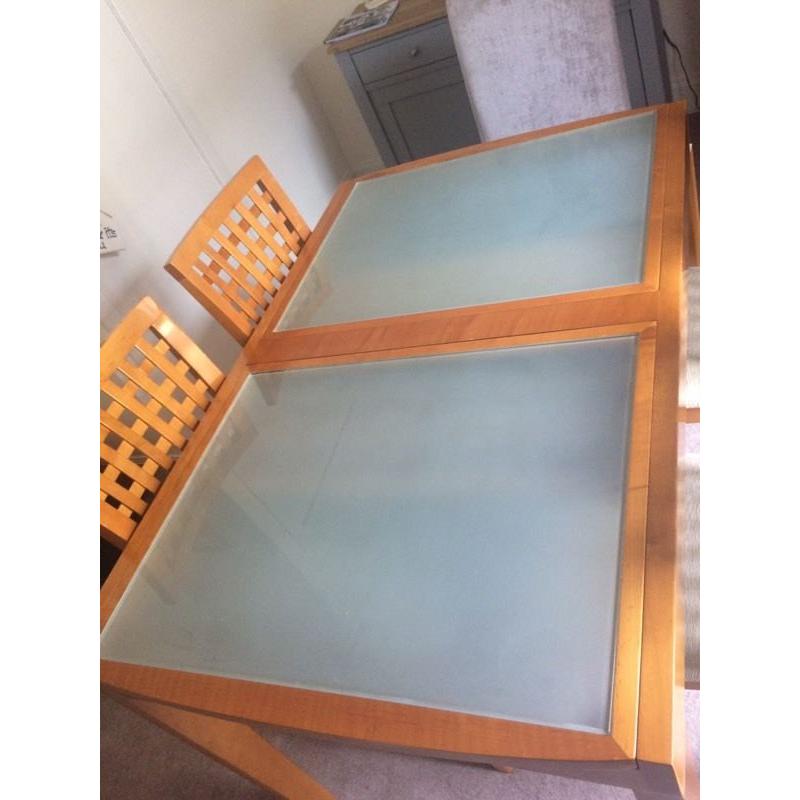 Glass topped table and chairs