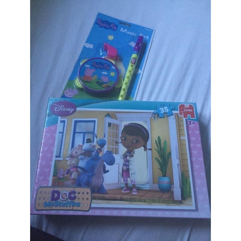 Doc McStuffins puzzle and peppa pig music set (both brand new)