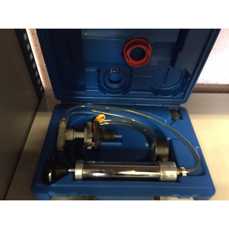 Coolant system pressure tester