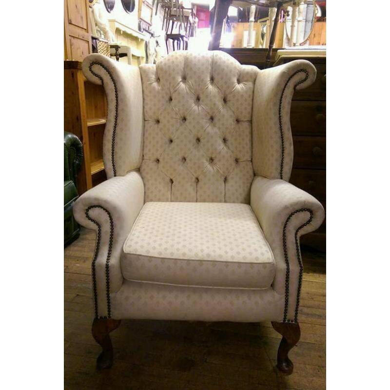 Fabric queen Anne style button back chair