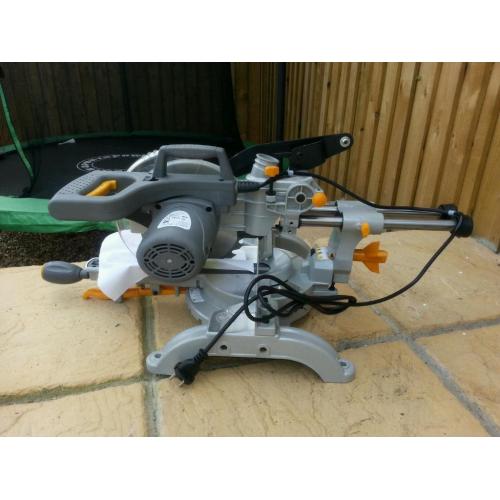 Miter saw tilt and slide