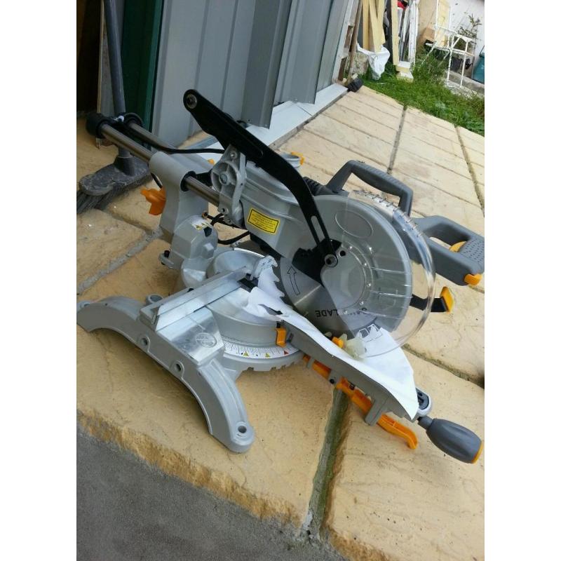 Miter saw tilt and slide