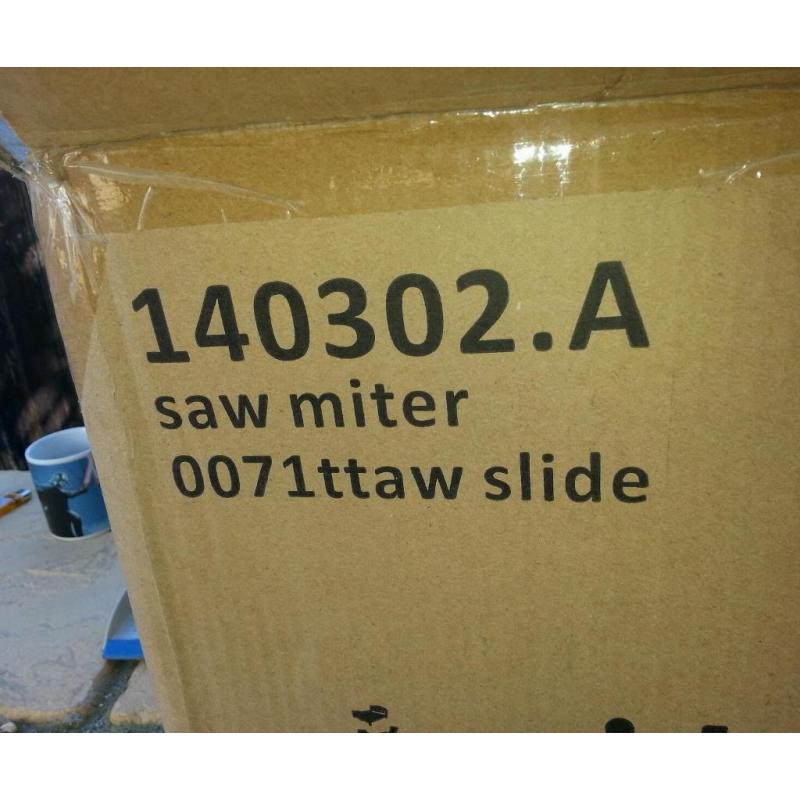 Miter saw tilt and slide