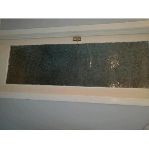 Two glass insert doors.