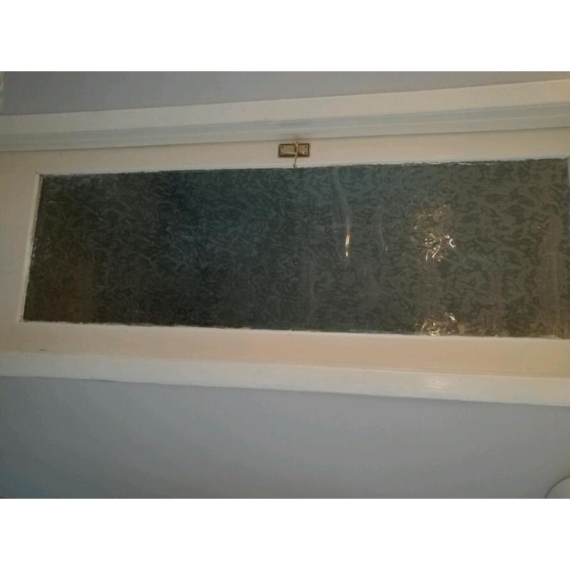 Two glass insert doors.