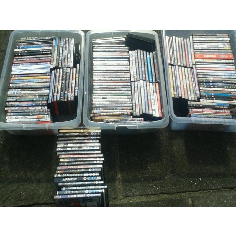 Job lot dvds plus 3 x plastic storage boxs