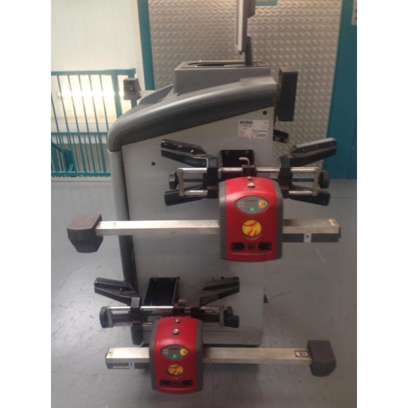 TRACKING MACHINE FOUR WHEEL ALIGNMENT
