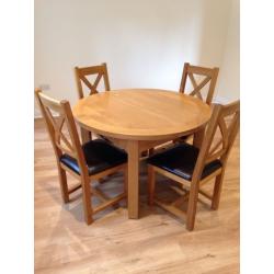 Oak extending dining table and 4 chairs