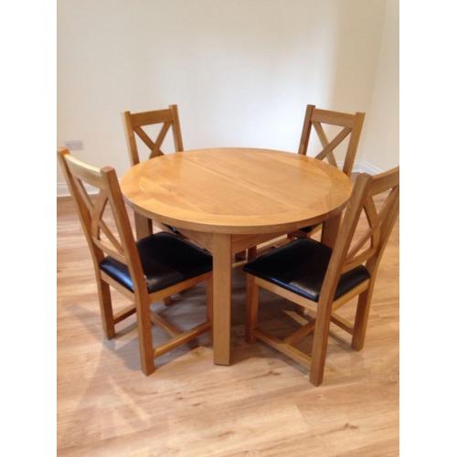 Oak extending dining table and 4 chairs