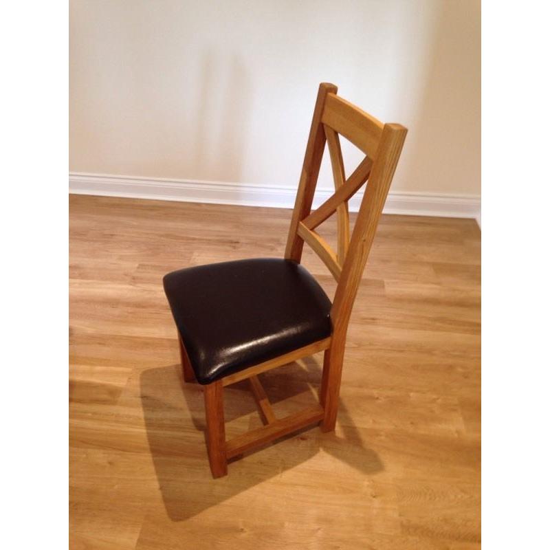 Oak extending dining table and 4 chairs