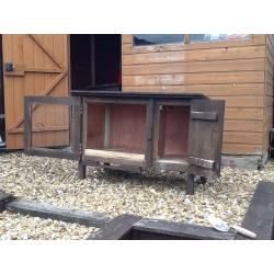 2 rabbit hutches with 2 sections