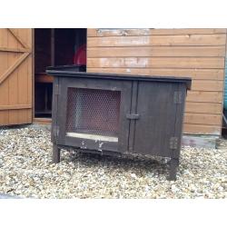 2 rabbit hutches with 2 sections