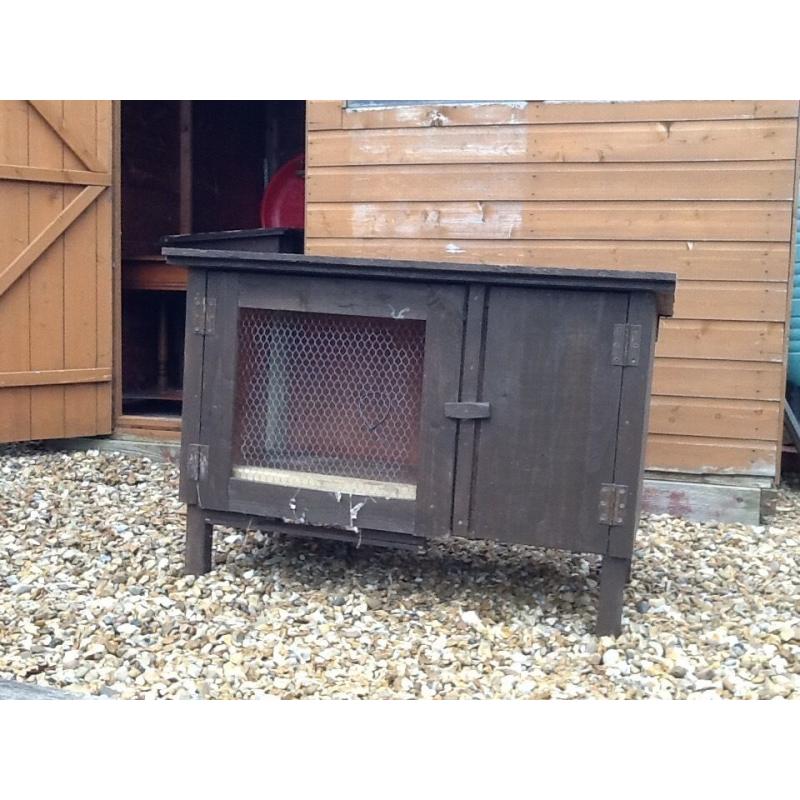 2 rabbit hutches with 2 sections