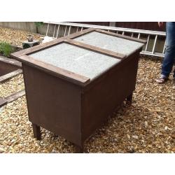 2 rabbit hutches with 2 sections
