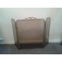 Decorative glass and brass firescreen