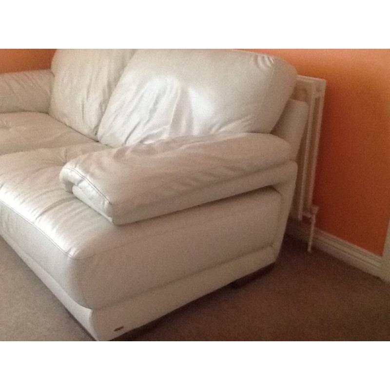 Two seater winter white leather sofa with foot stool