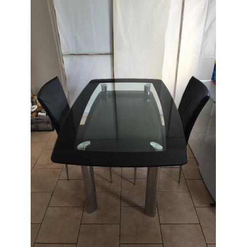 Glass top dining room table and four chairs, plus matching coffee table