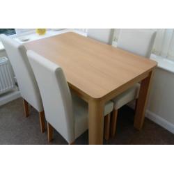 Dining table and 4 chairs