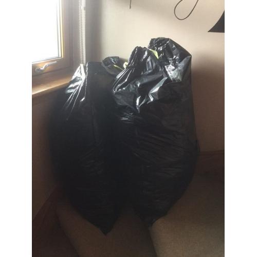 2 large black bags of boy clothes