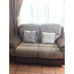 2x two seater recliner sofas