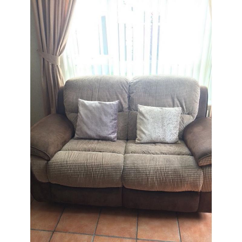 2x two seater recliner sofas
