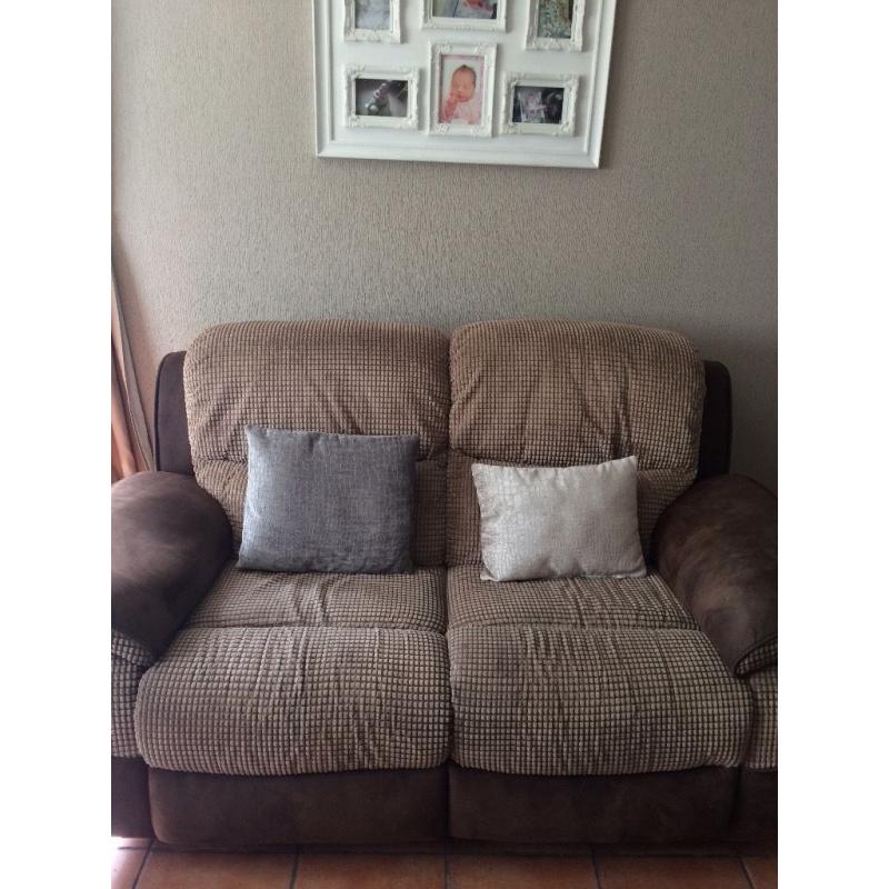 2x two seater recliner sofas