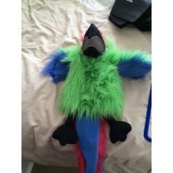 2 squawking parrot puppets
