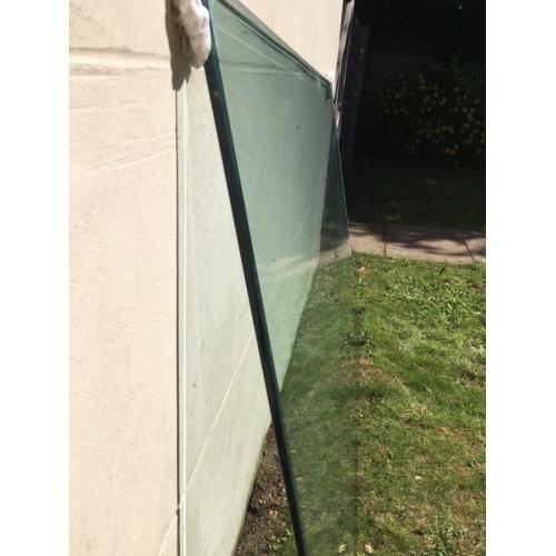 Reinforced glass table top