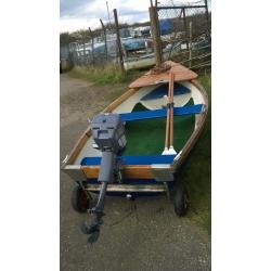 8 and a 1/2 ft Dinghy with Johnson 4HP Outboard engine