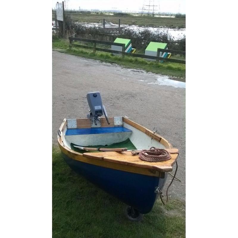 8 and a 1/2 ft Dinghy with Johnson 4HP Outboard engine