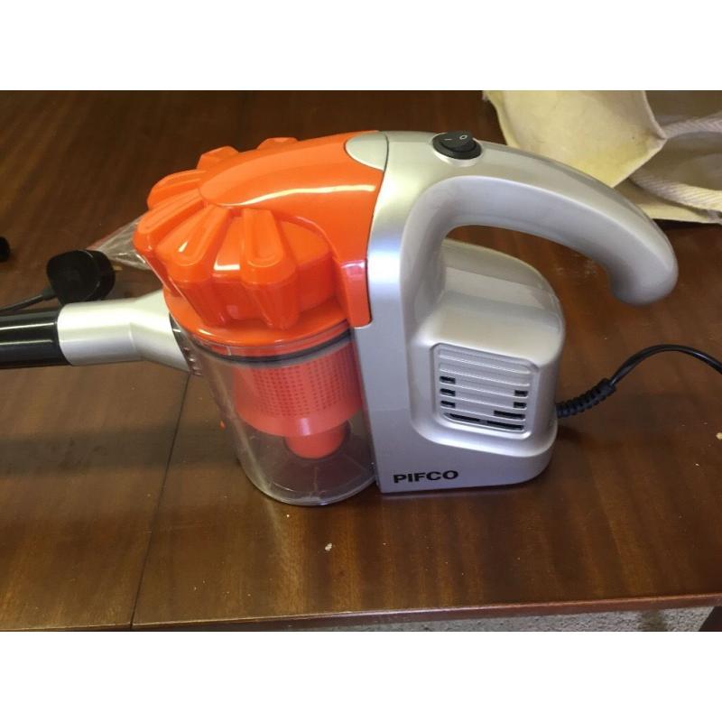 Compact hand held vacuum cleaner