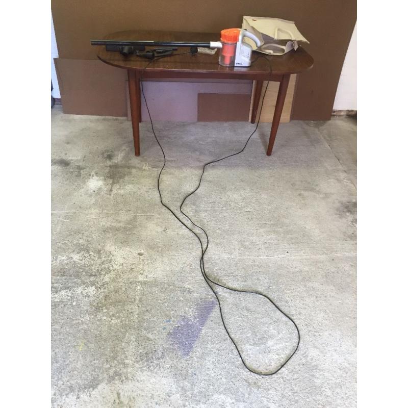 Compact hand held vacuum cleaner