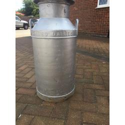 Large silver milk churn