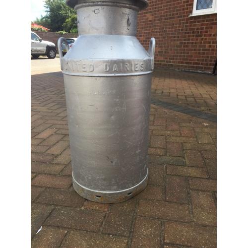 Large silver milk churn