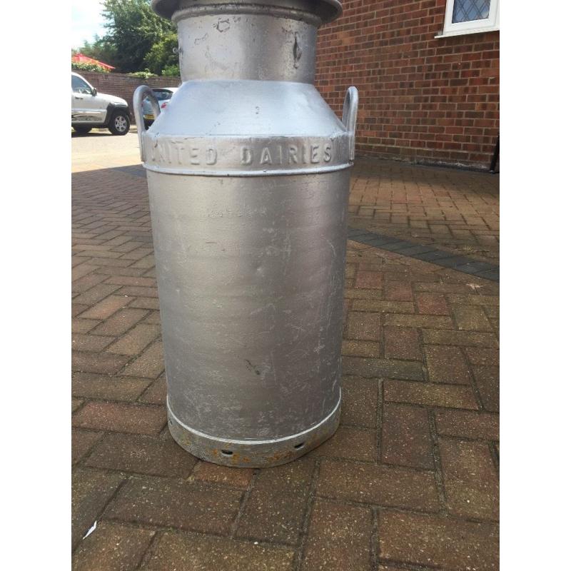 Large silver milk churn
