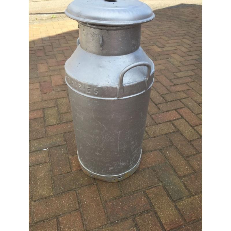 Large silver milk churn