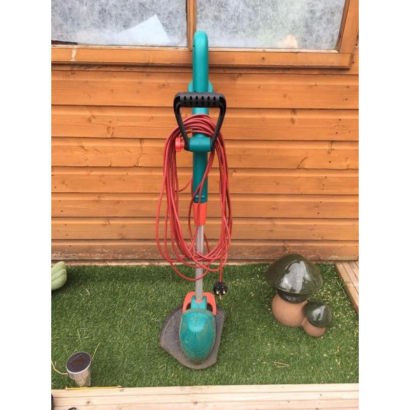 BOSCH COMBITRIM Garden Trimmer in immaculate condition.