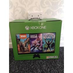 Xbox one 500 go with Kinect brand new and sealed with 7 game bundle